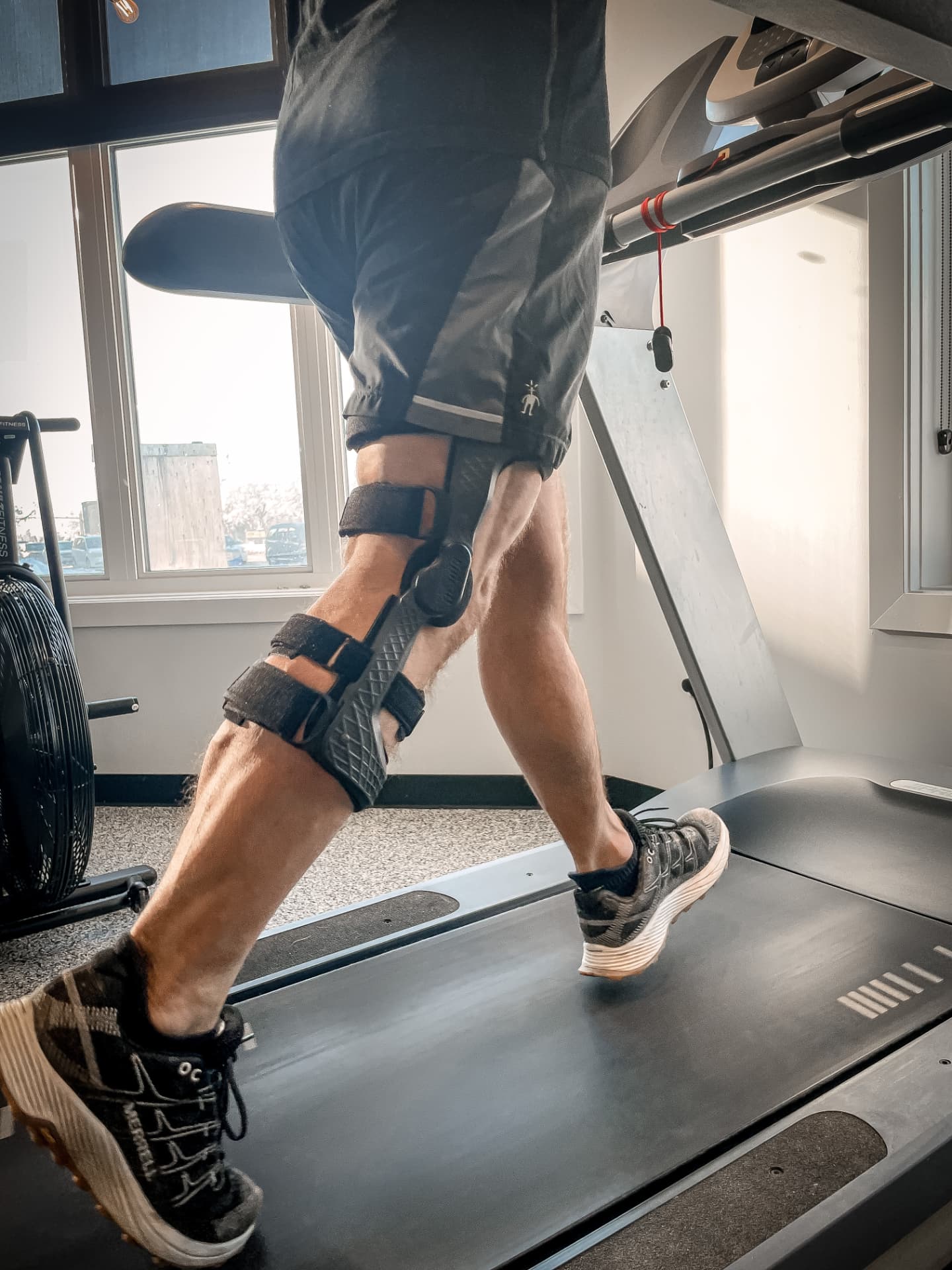Custom knee brace tested on a treadmill during a gait check