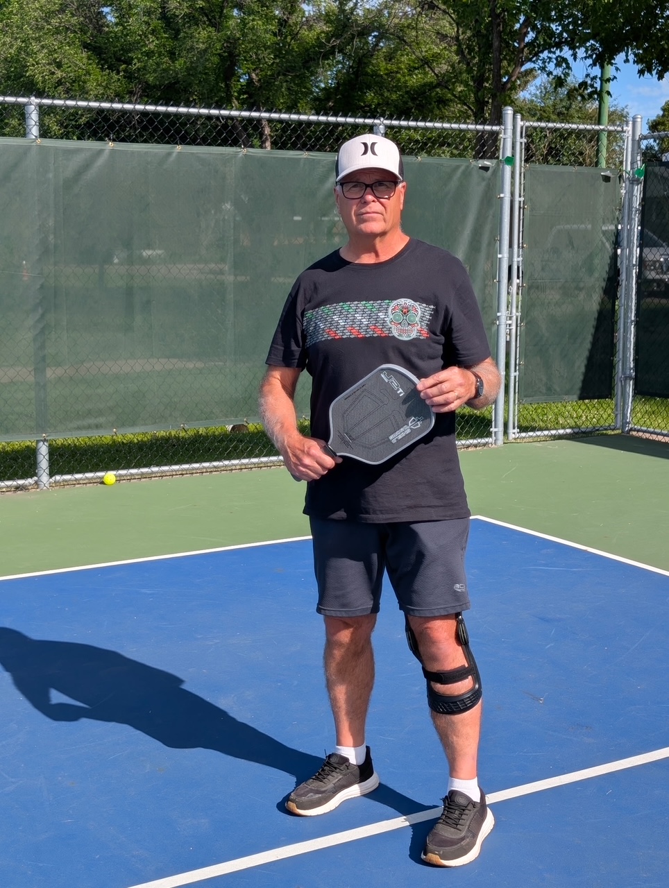 Pickleball player on the court in his custom SD Medical knee brace